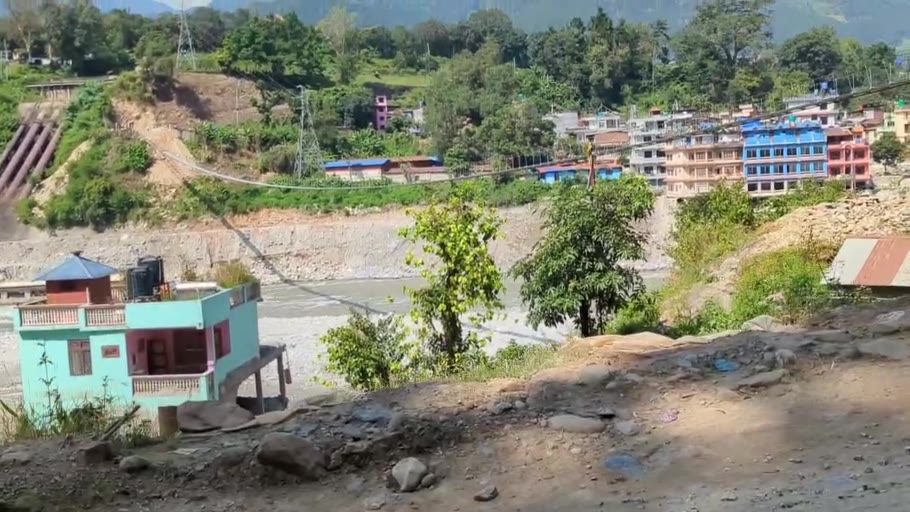 River terrain and buildings in Nepal